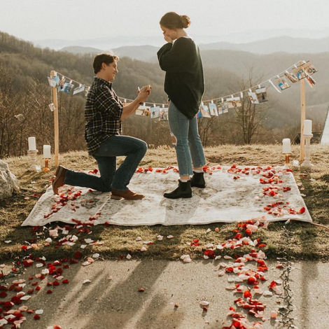 Engagement setup with assorted rose petals