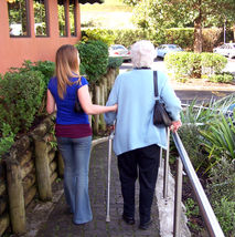 Volunteer walking with a client