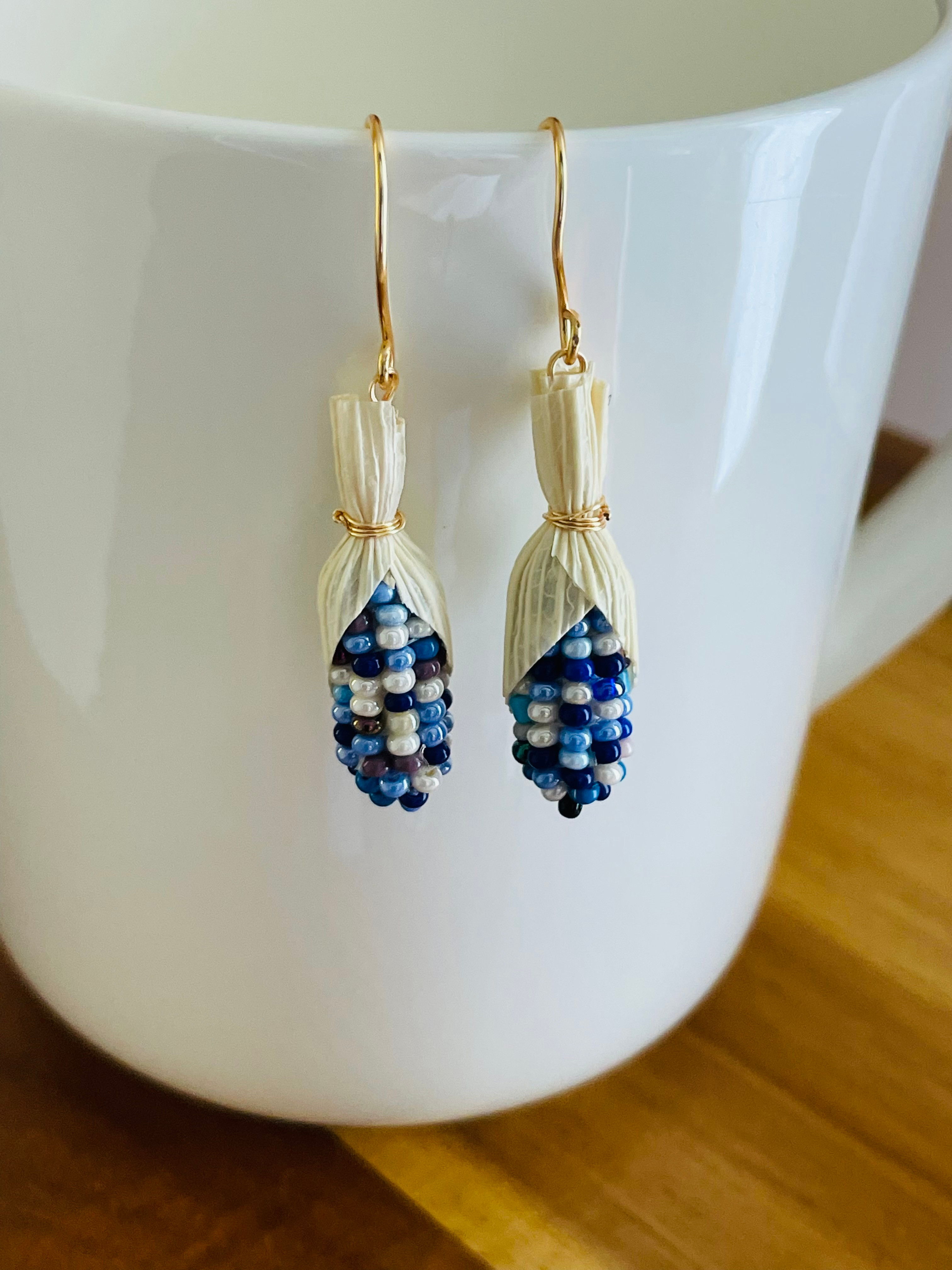"Blue corn husk hand-beaded dangle earrings handmade by indigenous women in Ecuador"