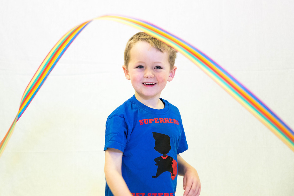 Superhero child dancing