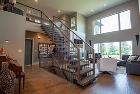 Steel mono stringer staircase with Maple butcher block treads.