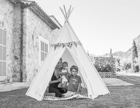 Hana Soukupova with her two kids in a teepee by Tatiana Luna