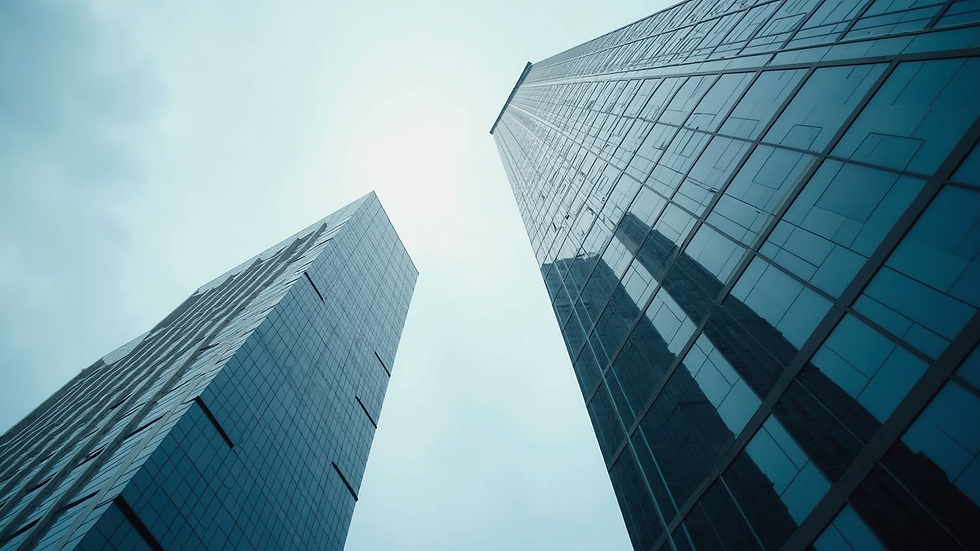 Eye-level view of a modern office building representing business asset protection