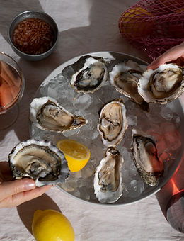 person-enjoying-dish-made-oysters.jpg