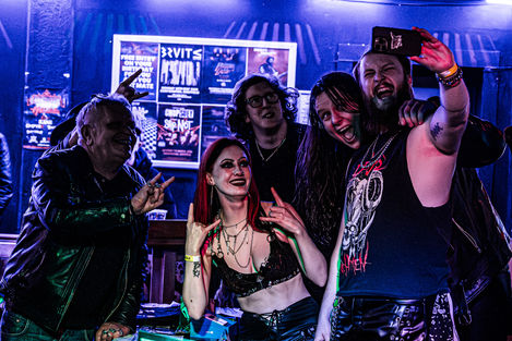 Wailing Banshee live at Corporation Sheffield 2026. Call of the Wild Festival Trailblazer. Dani Louise, Richie Parkhouse, Al McKenzie, and Harry Darbyshire take a photo with a fan. Photo by Nic Howells.