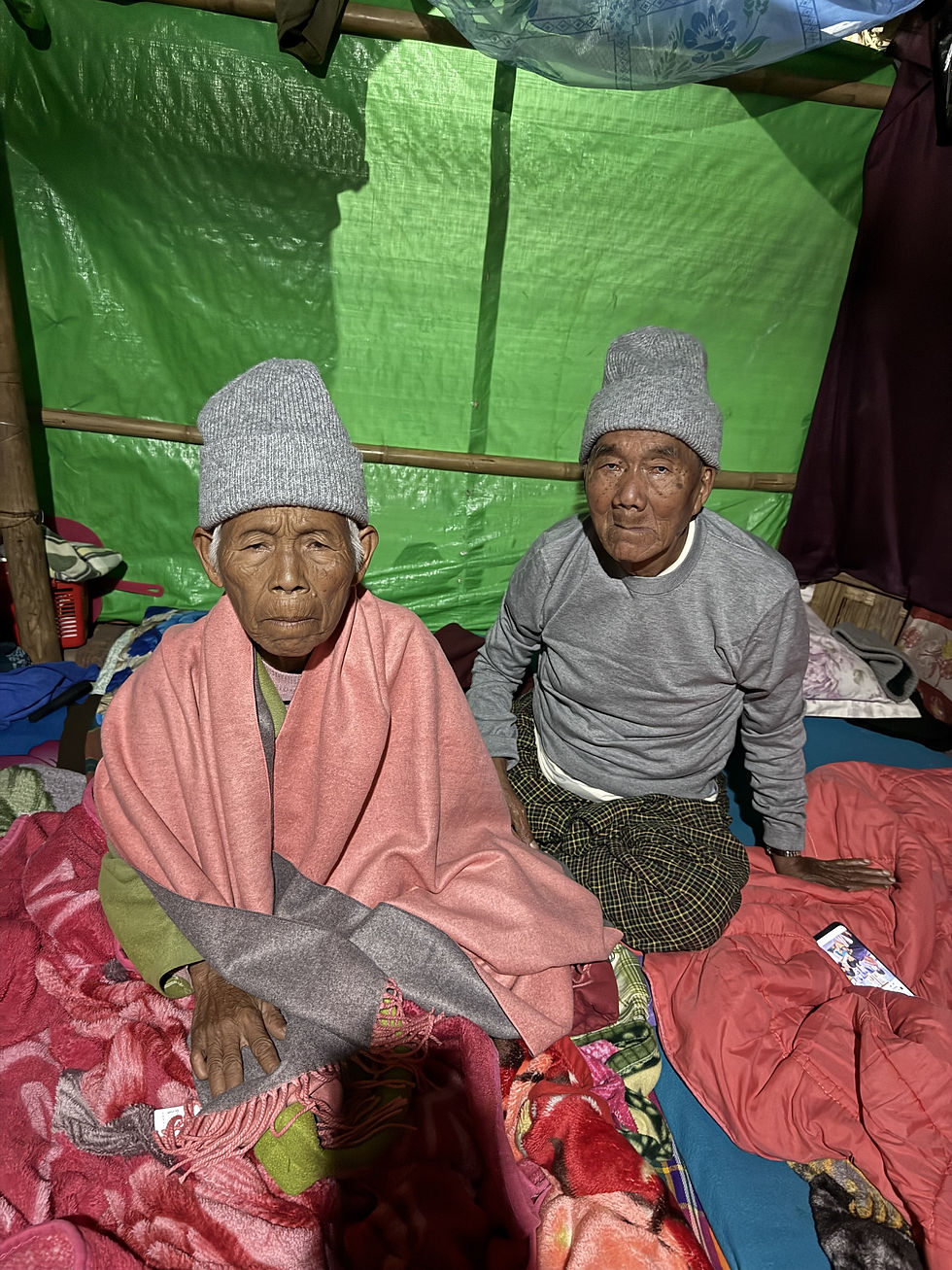 Two elderly couples on their bed