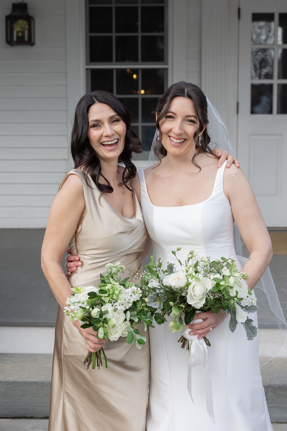 Lauren chose a white modern mermaid style silk gown before switching to a fun mini dress for the reception. Her maid of honor wore a champagne silk gown. 