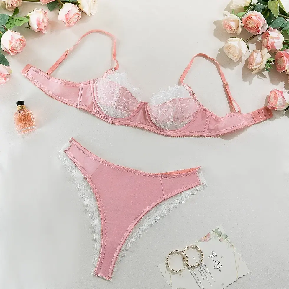 Thumbnail: Pink lace bodysuit and bra set