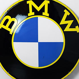 Yellow-Rimmed BMW Button Sign