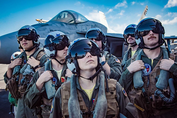 aircraft pilots in front of aircraft