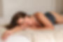 woman wearing steel grey bodysuit teddy lingerie boudoir outfit / woman laying on a bed boudoir pose during knoxville, tn boudoir photo shoot / knoxville tennessee boudoir photography / photo by knoxville boudoir photographer / see more at rosewoodboudoir.com