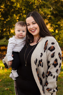 mother and son in the fall at knoxville botanical gardens during Knoxville TN maternity portrait session photo by Knoxville maternity, newborn, and family photographer Wood Shutter Photography