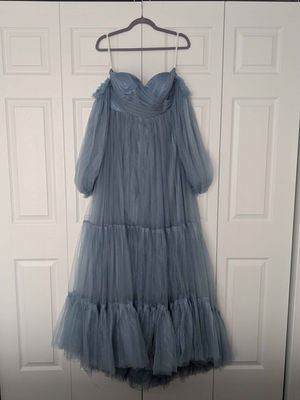 Dusty blue maternity gown with removable sleeves and a corset back.