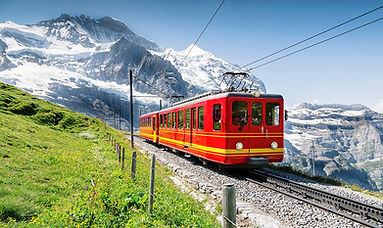 famous-train-with-jungfrau-mountain-sunny-day.jpg