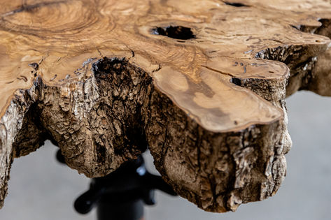 Live edge walnut slab end table with natural finish