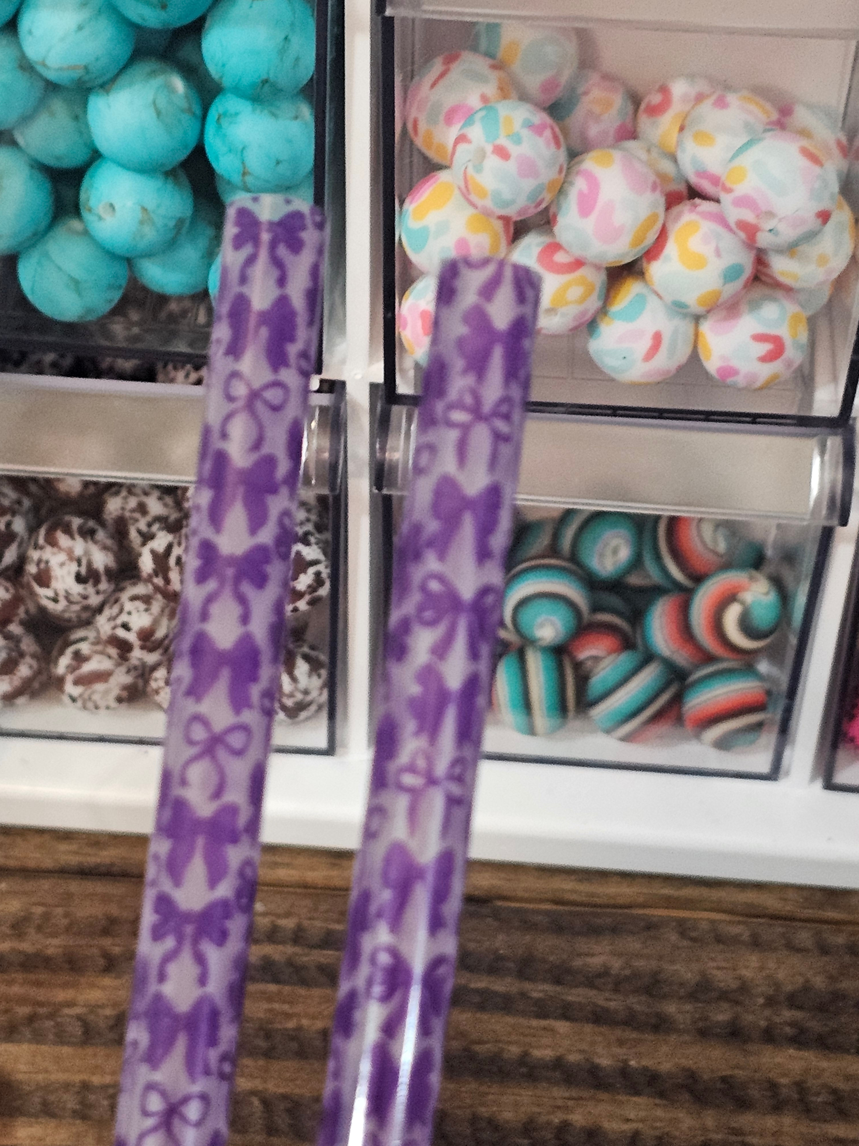 Clear with purple bows straw