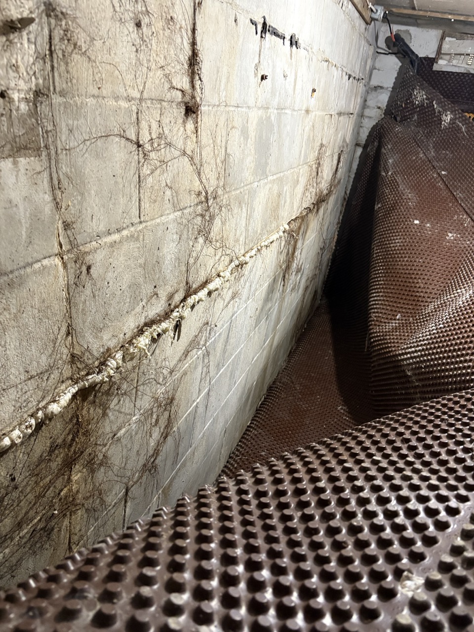A foundation wall that is bowing inside.