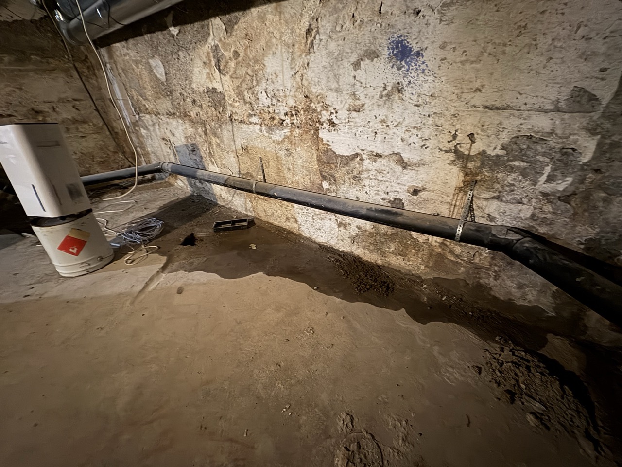 Water leaking into a basement.