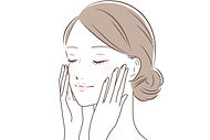 頬に手をあてお顔を確認している女性