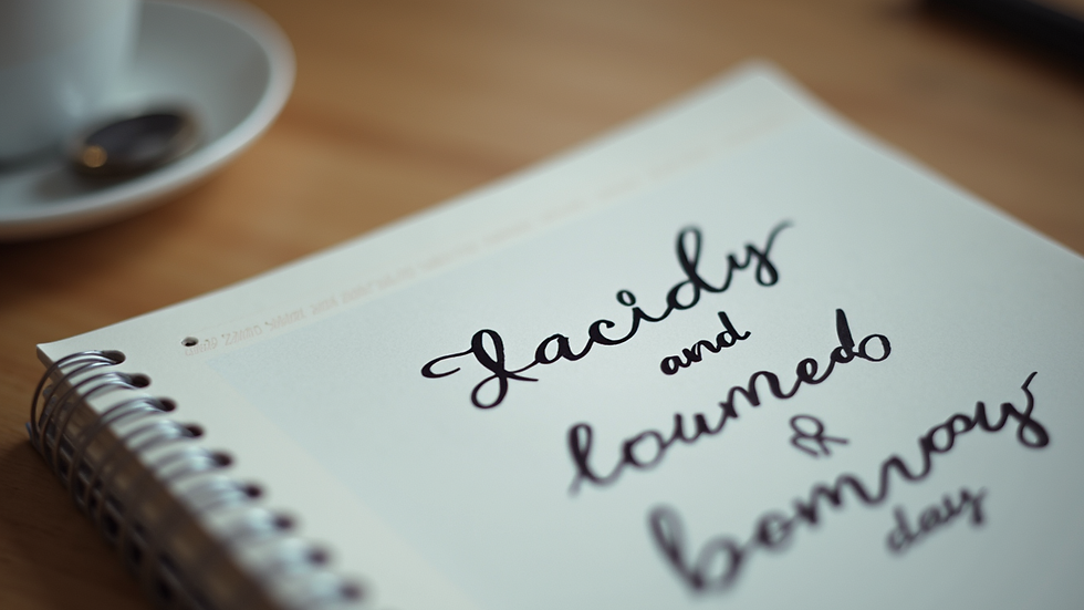 Close-up view of a notebook with motivational quotes