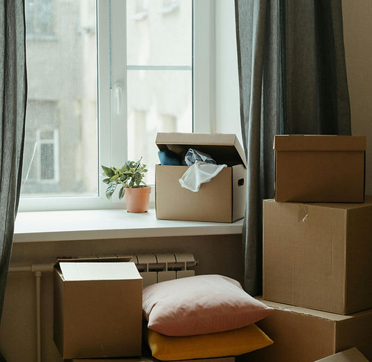 Professional movers handling furniture during residential move