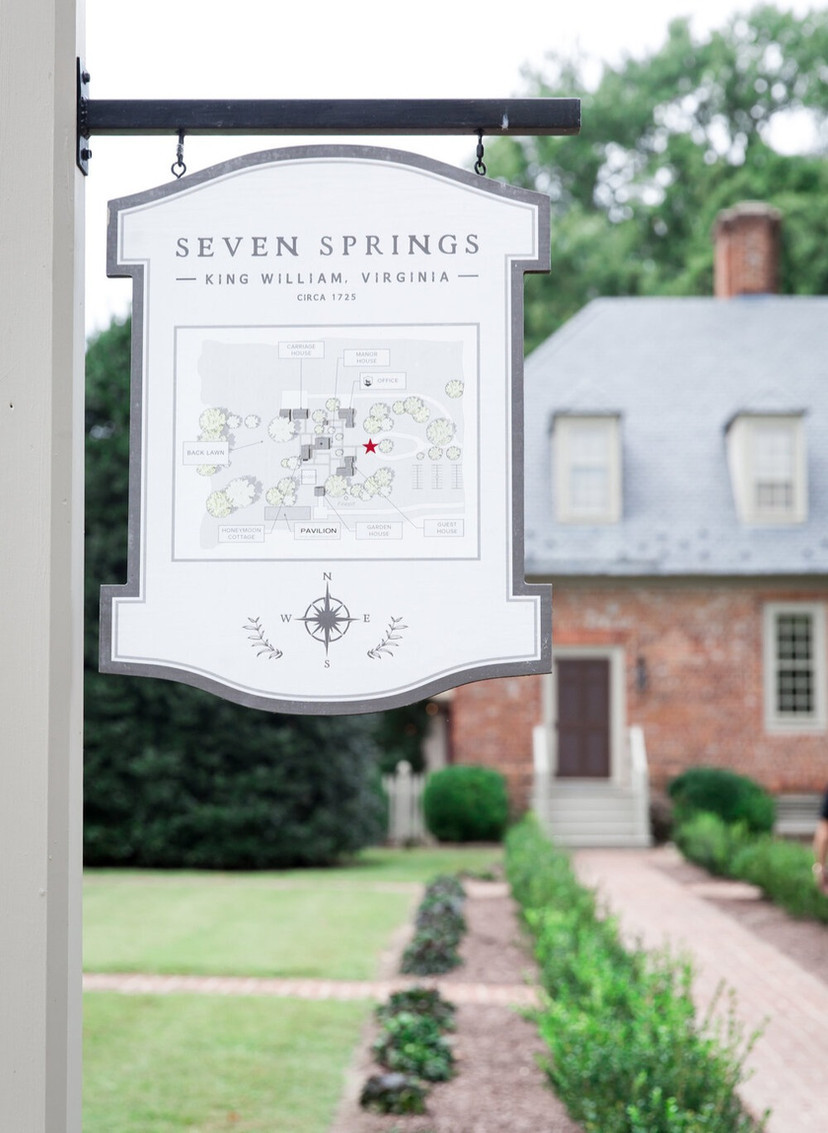 sign that says seven springs