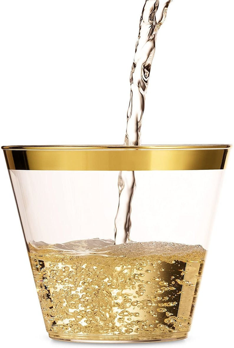 photo of gold colored plastic cups with a gold rim with liquid being poured in. Enlarged to show detail. featured on the Unmeasured Events Blog