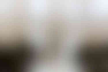 groom reading his wedding vows to his new bride up at their wedding alter. all via unmeasured events