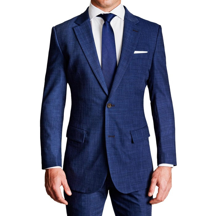 Large close up of a man's torso that feature a lined micro print design. the suit is all blue with a matching blue tie and a white shirt. All via Unmeasured Events