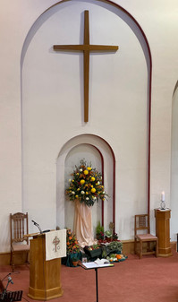 Cross above Harvest display