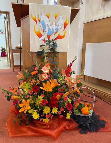 Flowers by the lecturn