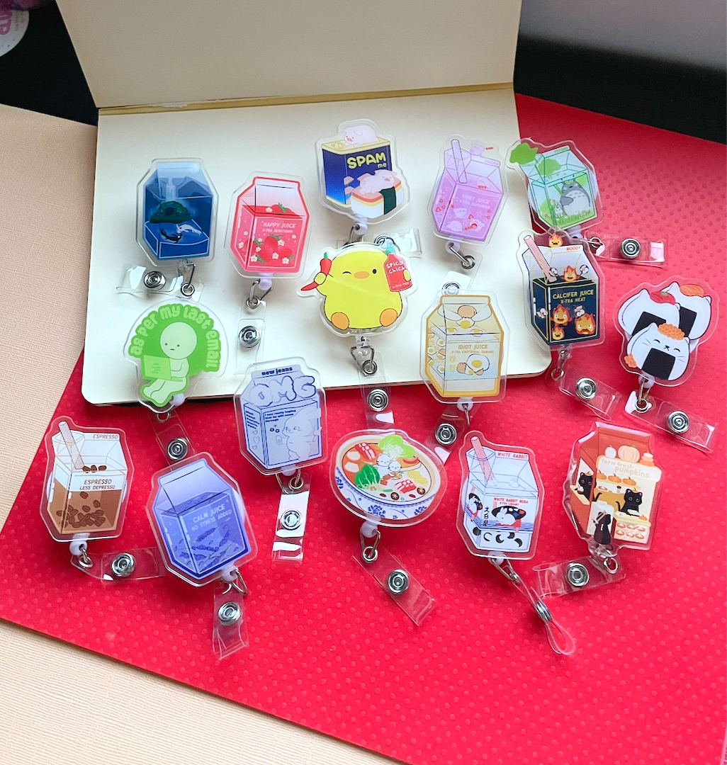 The Juice Box Club Badge Reel - Belt Clip 