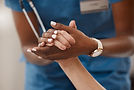 shot-of-a-doctor-holding-hands-with-her-patient-du-2025-04-06-07-48-39-utc.jpg