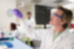 Lab technician preparing pharmaceutical samples for analysis in the sample preparation laboratory.