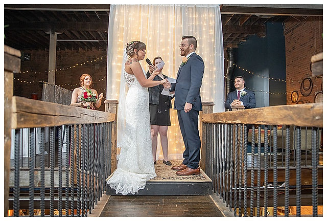 wedding ceremony at distillery