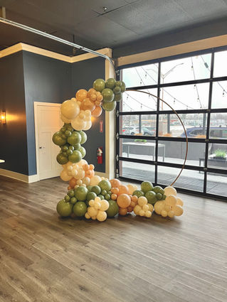 gold and sage balloon backdrop 
