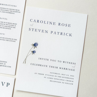 classic wedding invitation with clean font and blue floral design
