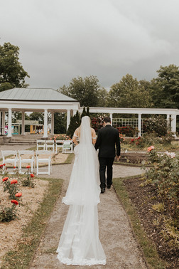 bride and groom in outdoor gardens at The Terrace at Delaware Park 