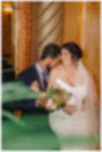 married couple in glamorous vintage venue with gold and floor to ceiling mirror