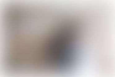 bride and groom wedding photos with letter wall art