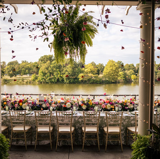 outdoor wedding reception tablescape overlooking Hoyt lake