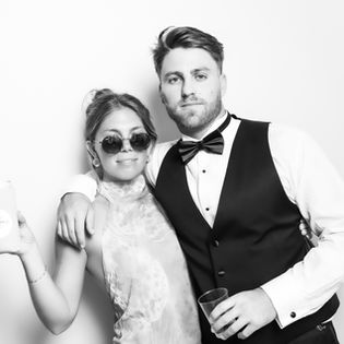 bridesmaid and groomsman black and white photobooth photo