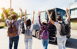 overjoyed-young-people-wait-travel-bus.jpg