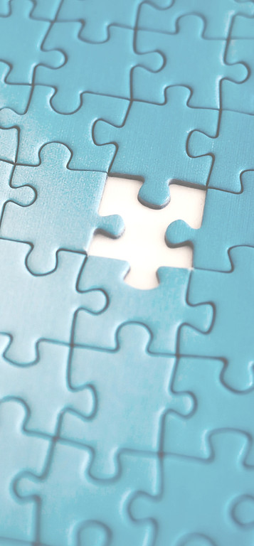 A piece of a puzzle with a missing piece
