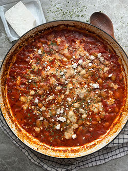 Greek style giant beans in tomato sauce topped with feta cheese 