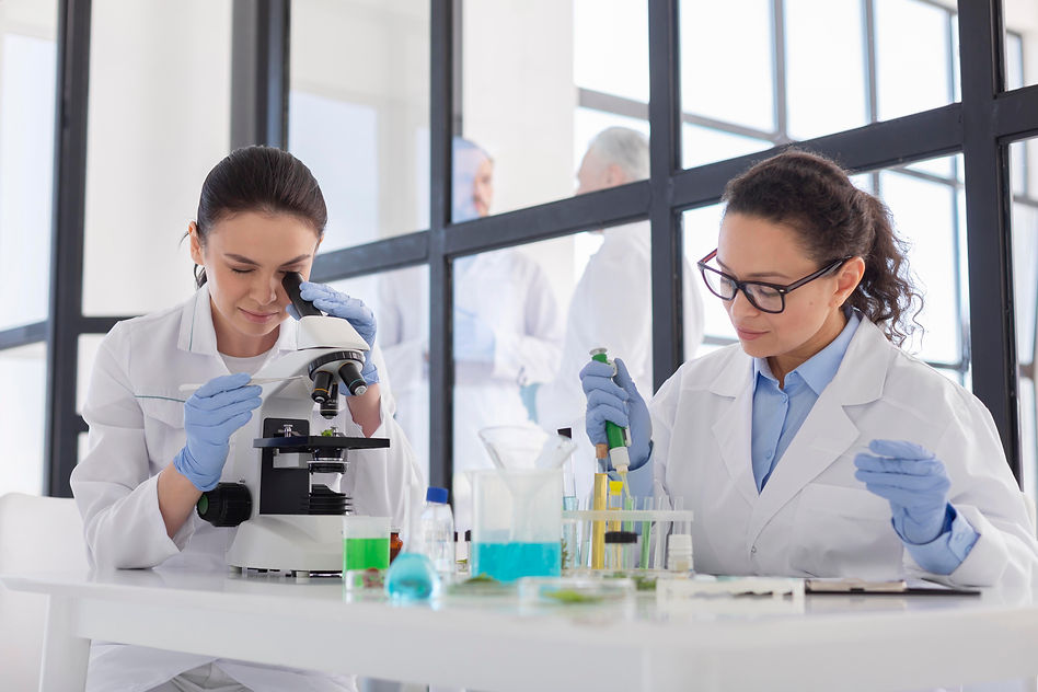 scientists-working-lab-medium-shot.jpg