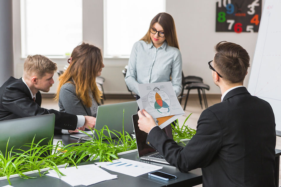 group-businesspeople-analyzing-graph-workplace.jpg