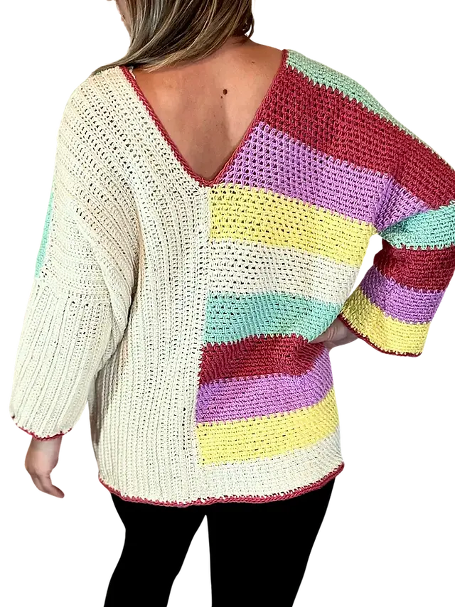Back view of the Happy Stripes Sweater crochet pattern, featuring one half in cream vertical stitches and the other in colourful horizontal stripes, finished with a V-neck and relaxed fit.