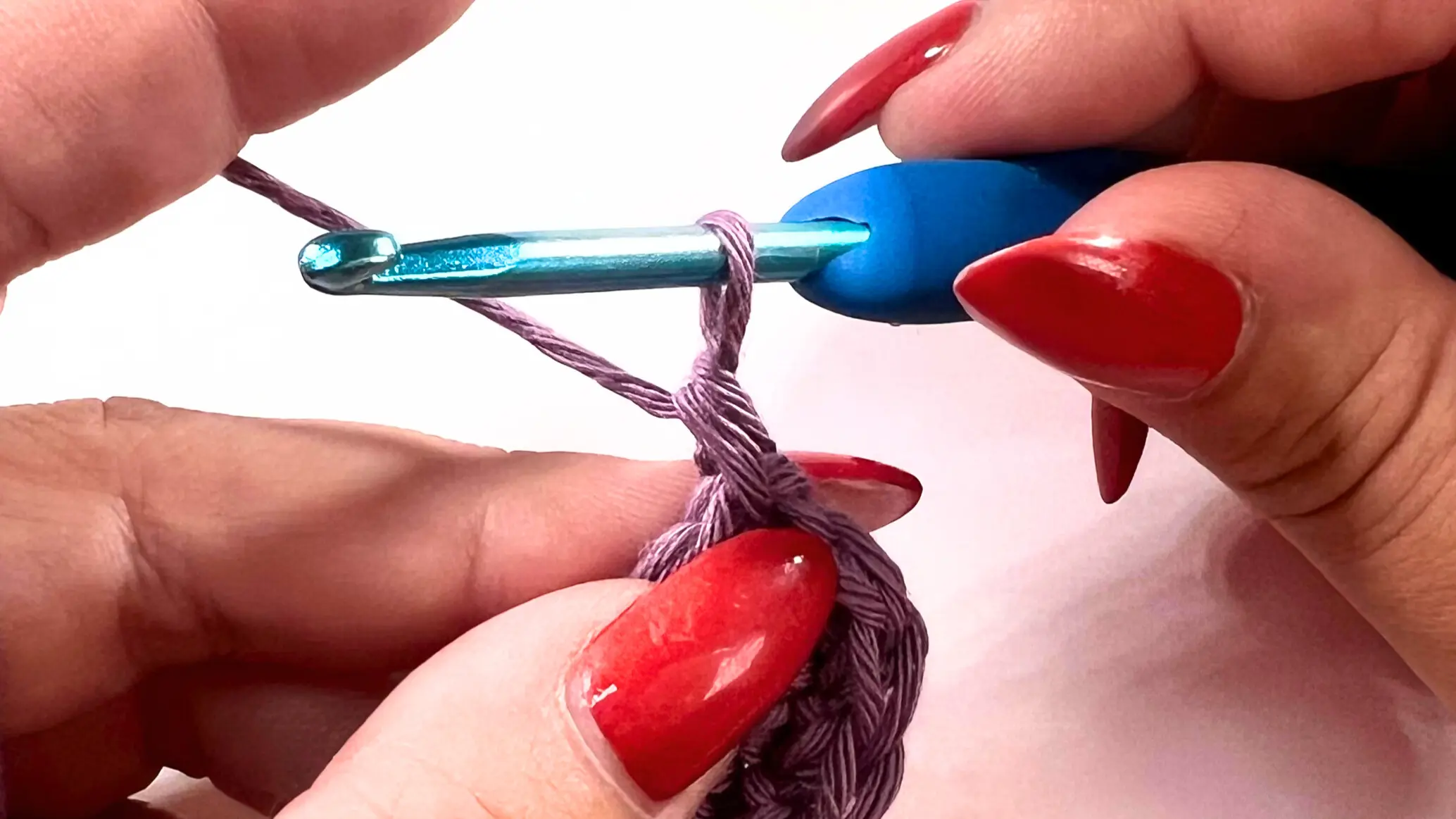 Finished crochet stitches showing smooth edge after invisible join.