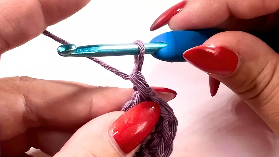 Finished crochet stitches showing smooth edge after invisible join.